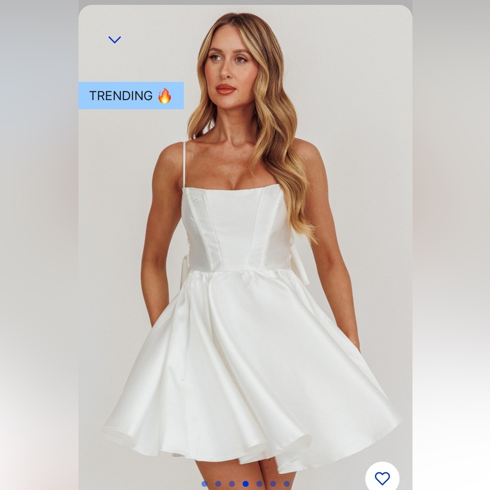 NEW WITH TAGS Satin mini dress with bow on back.